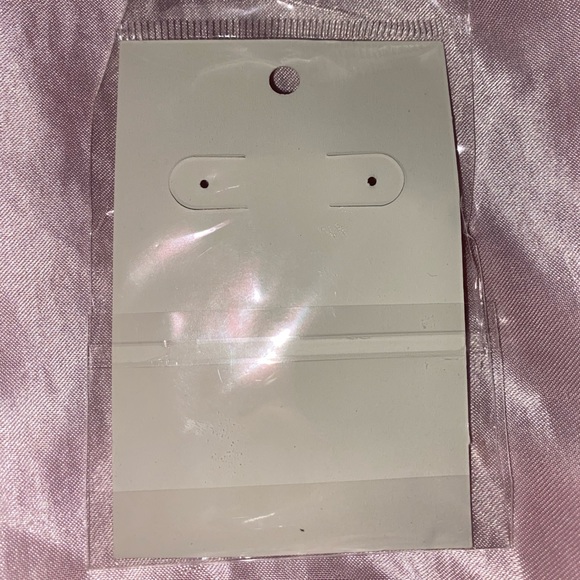 A sliver hoop earring - Picture 3 of 3